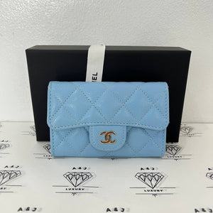 [PRE LOVED] Chanel Flap Cardholder in Light Blue Caviar Leather Light Gold HW (microchipped)