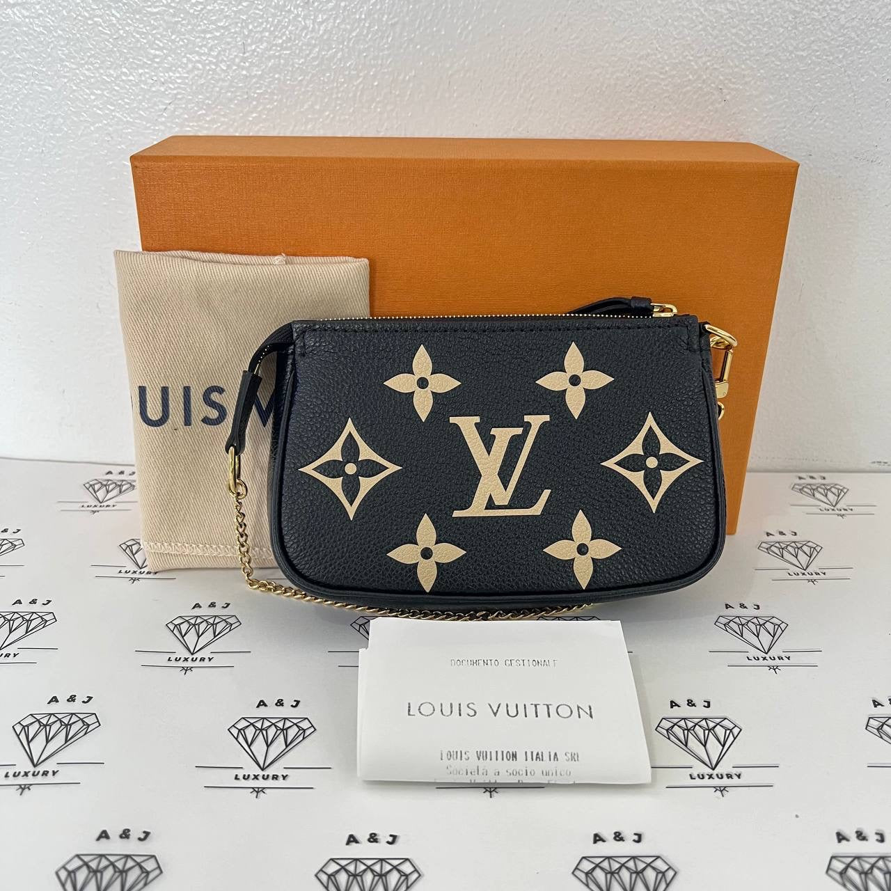 Louis vuitton pochette mini shops accessoires