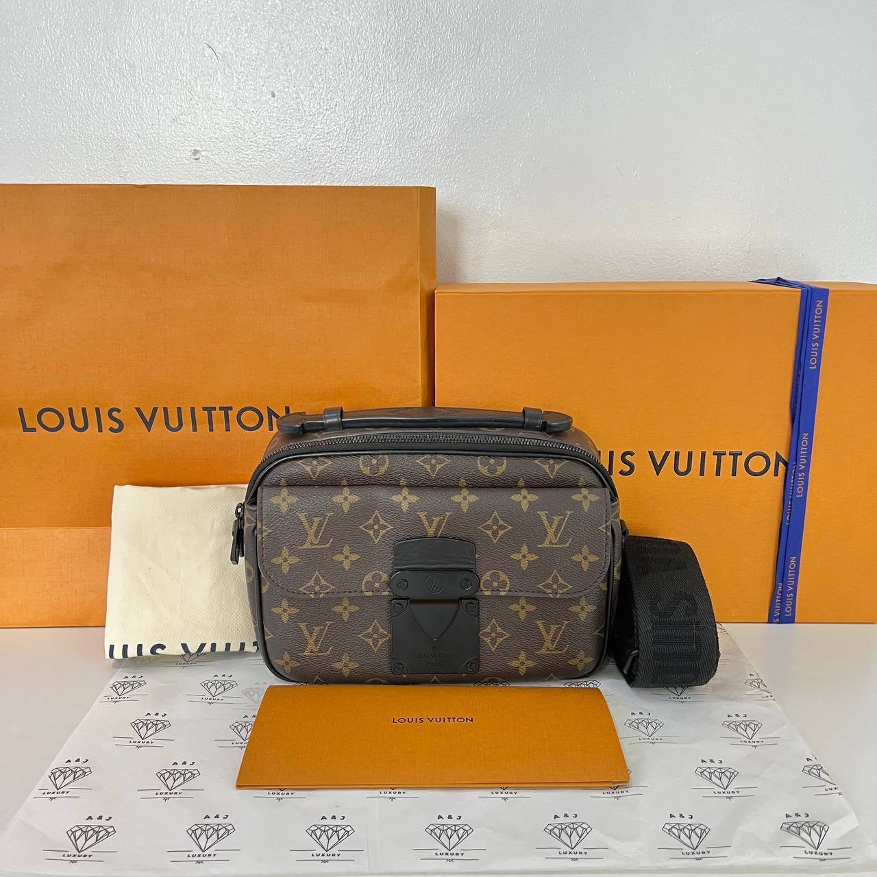 [PRE LOVED] Louis Vuitton S Lock Messenger Bag in Monogram Canvass  (microchipped)