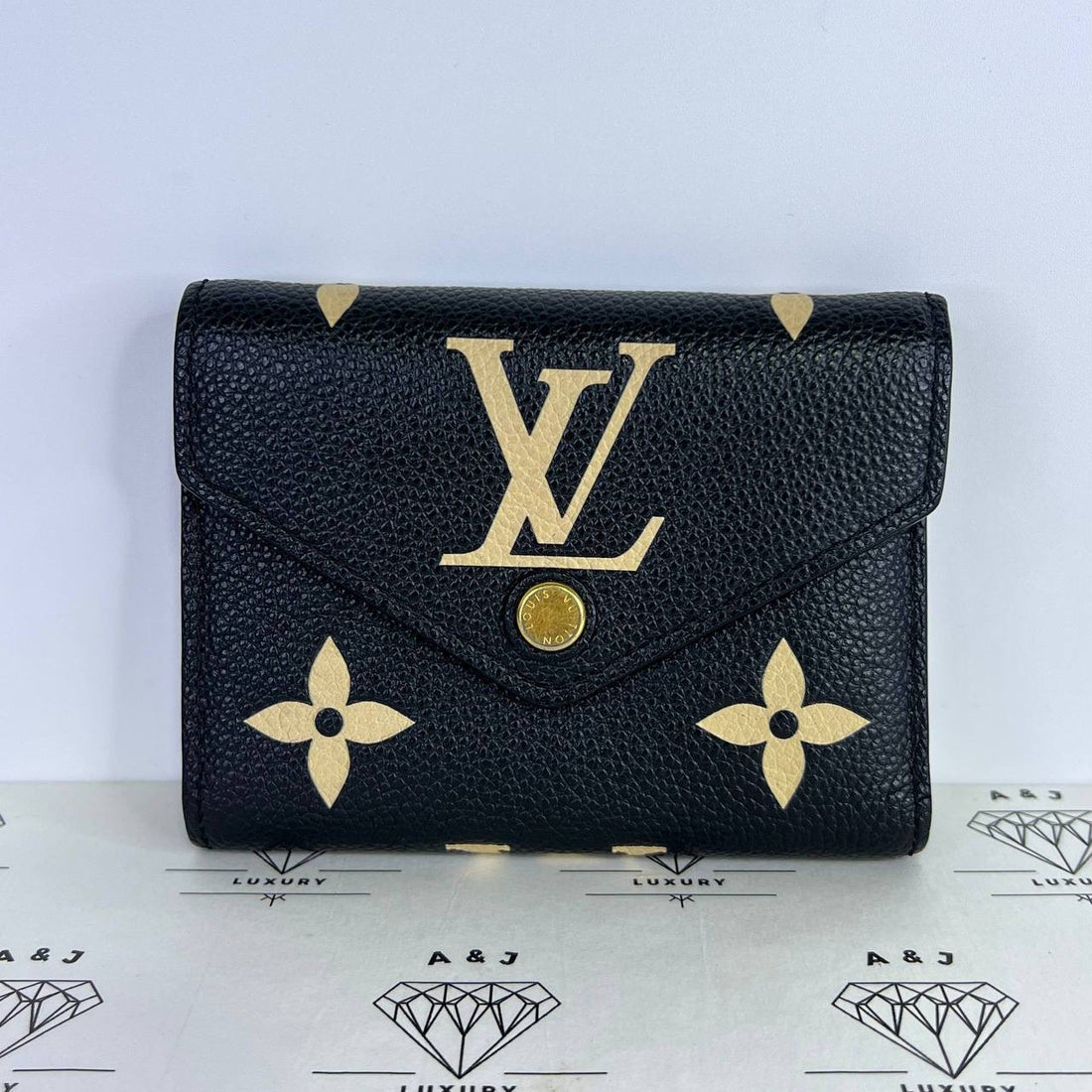 [PRE LOVED] Louis Vuitton Victorine Wallet in Black/Creme Empreinte Leather GHW (microchipped)