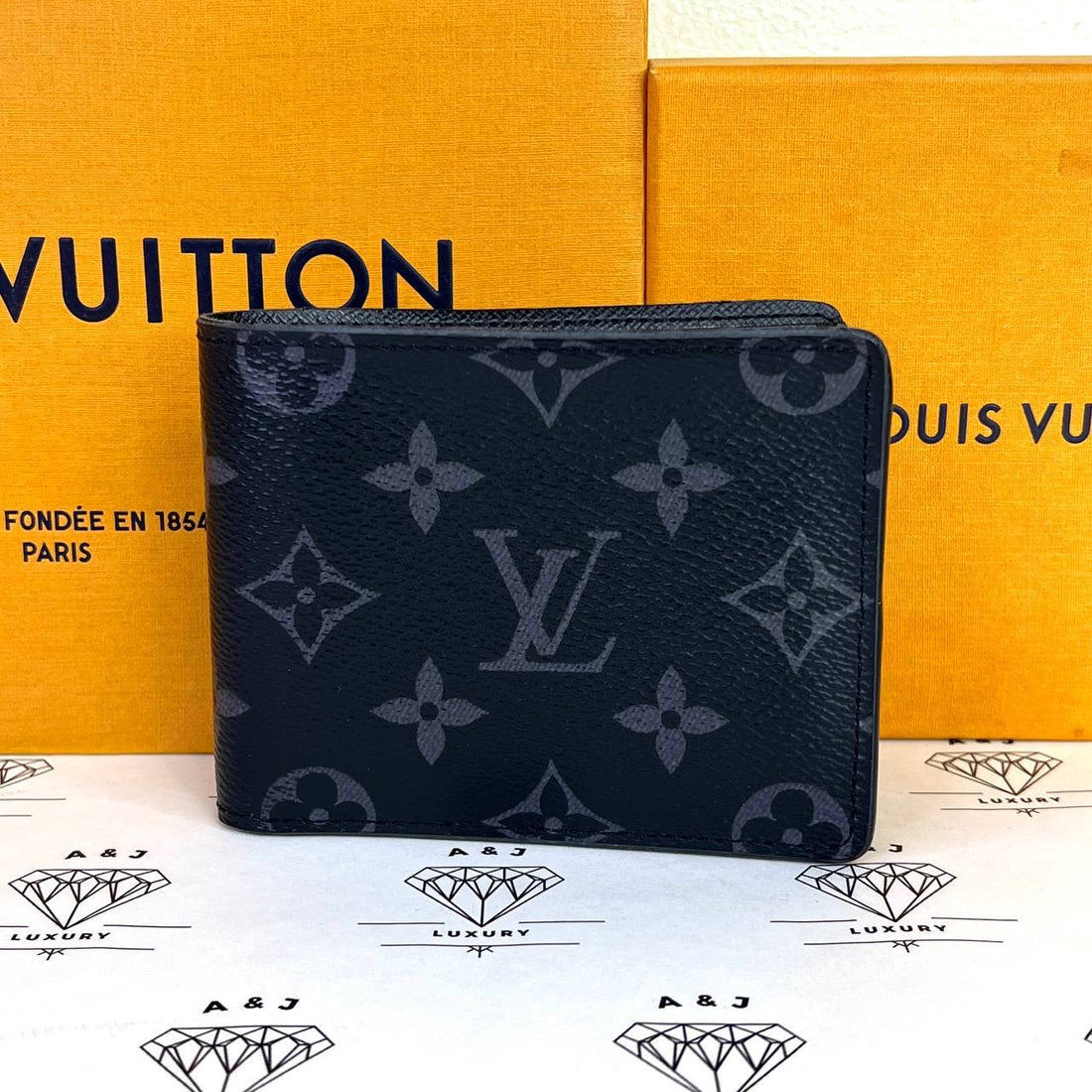 [PRE LOVED] Louis Vuitton Multiple Wallet in Monogram Eclipse Canvass (microchipped)