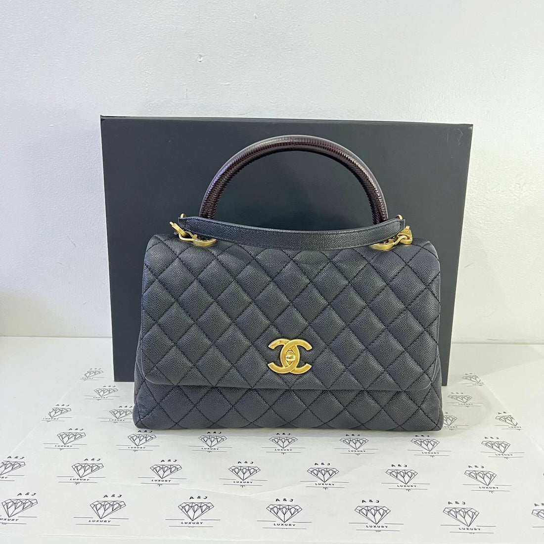 [PRE LOVED] Chanel Medium Coco Handle in Black Caviar Aged Gold HW (Series 29)