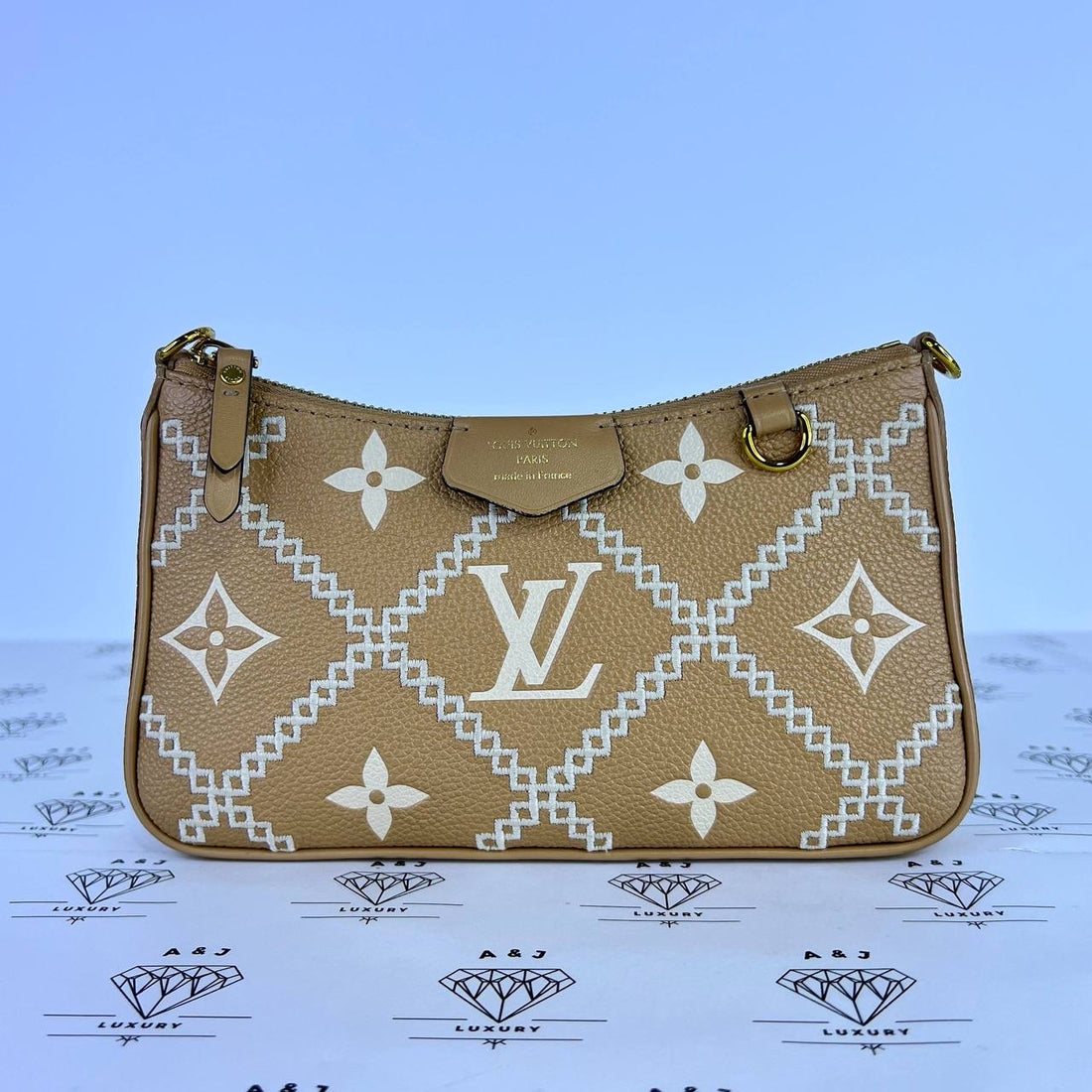 [PRE LOVED] Louis Vuitton Easy Pouch on Strap in Arizona Empreinte Leather (microchipped)