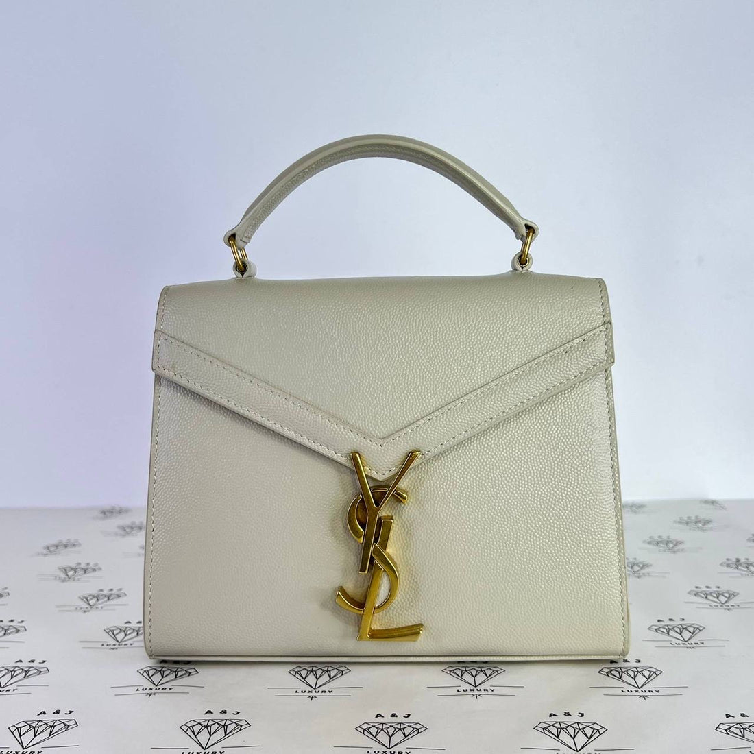 [PRE LOVED] YSL Mini Cassandra Top Handle in White Grain De Poudre GHW