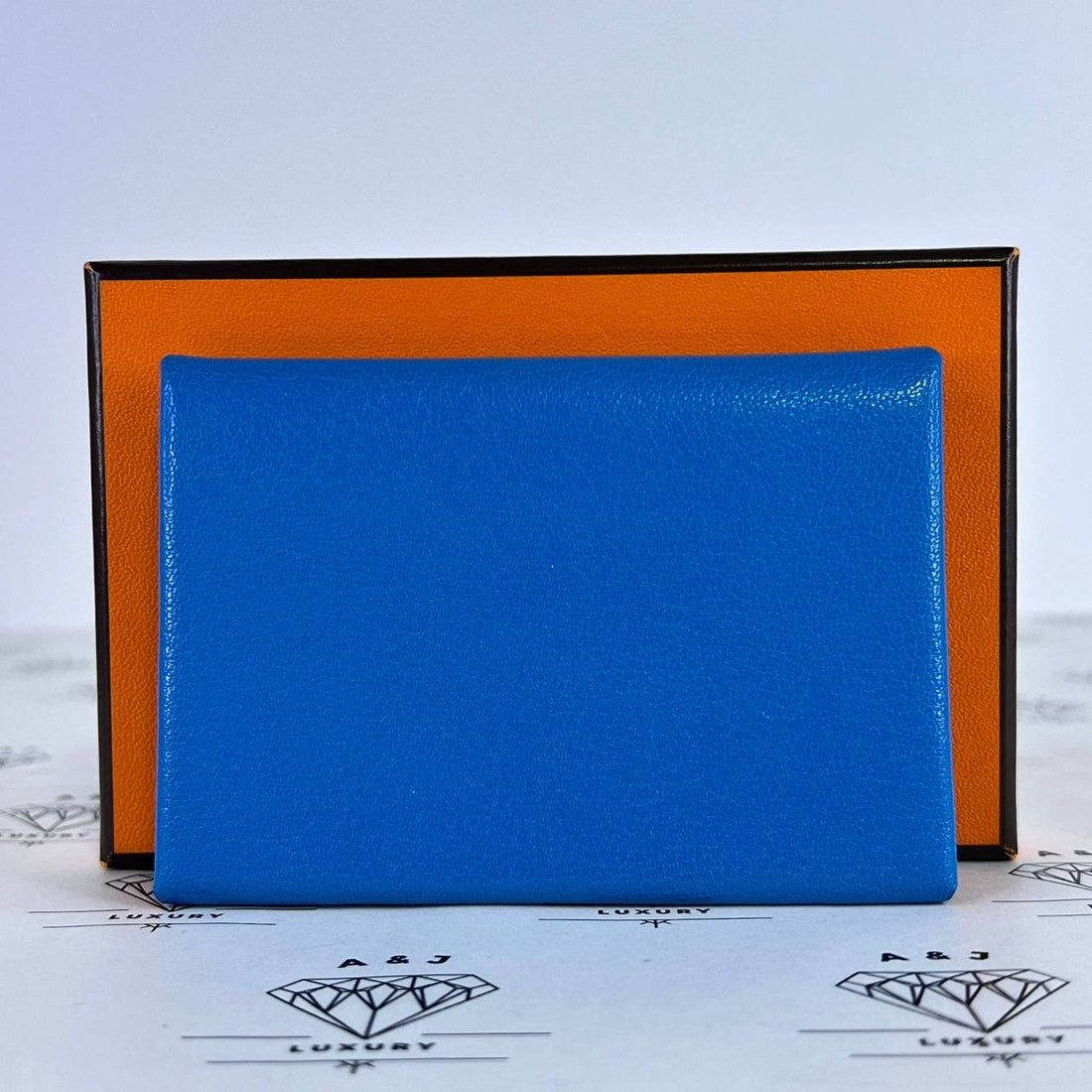 [PRE LOVED] Hermes Calvi Duo in Blue Chevre PHW (Stamp B - 2023)