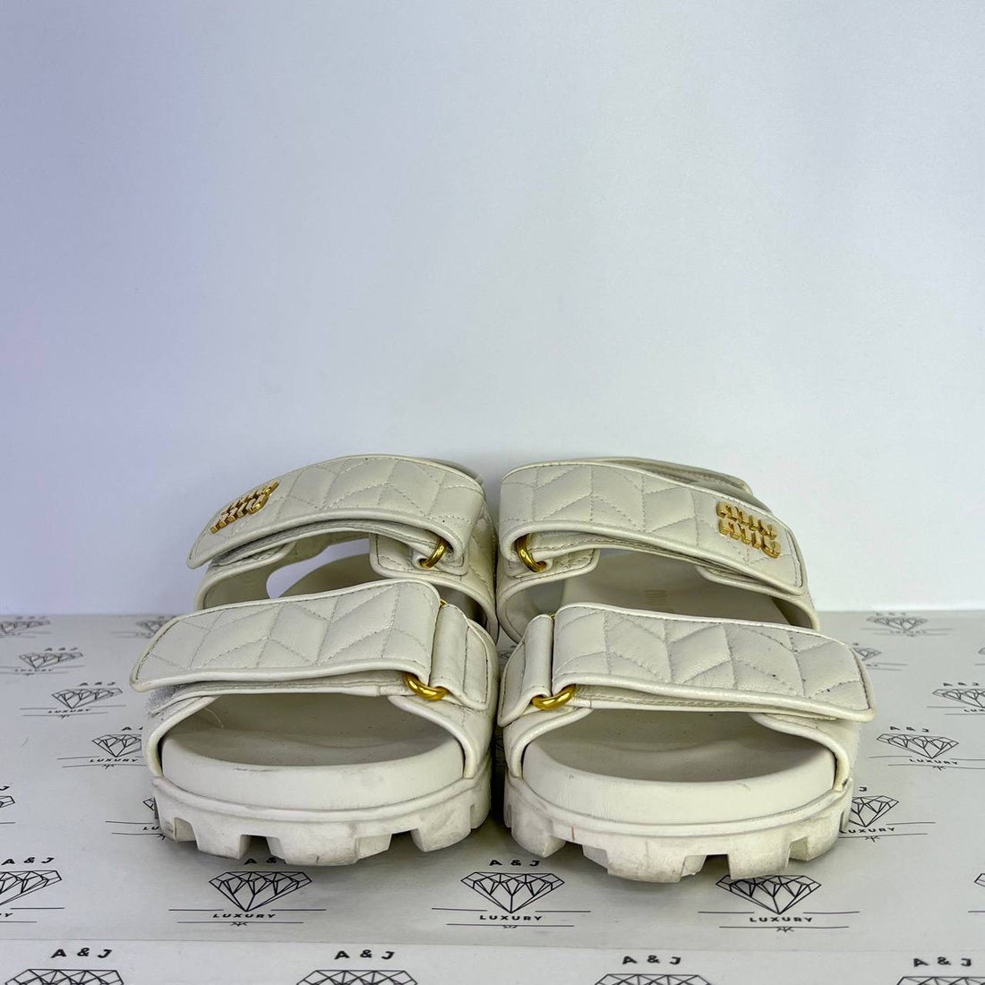 [PRE LOVED] Miu Miu Nappa Dad Sandals in White Size 37EU