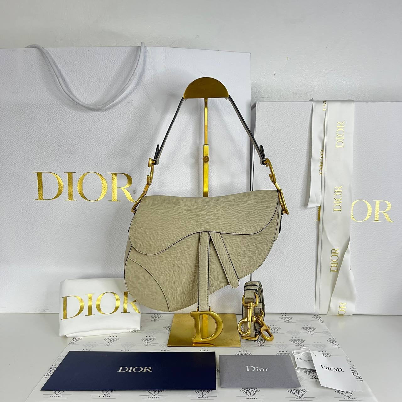 [PRE LOVED] Christian Dior Saddle with Strap in Powder Beige Grained Calfskin Leather GHW (2023)