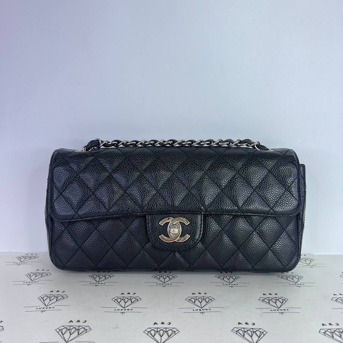 [PRE LOVED] Chanel East West Flap Bag in Black Caviar SHW (Series 10)