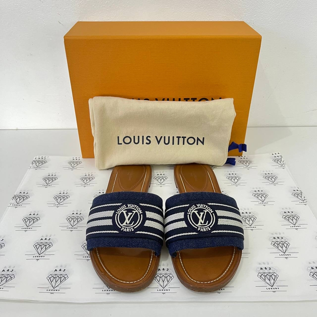 [PRE LOVED] Louis Vuitton Lock it Mules in Size 41EU