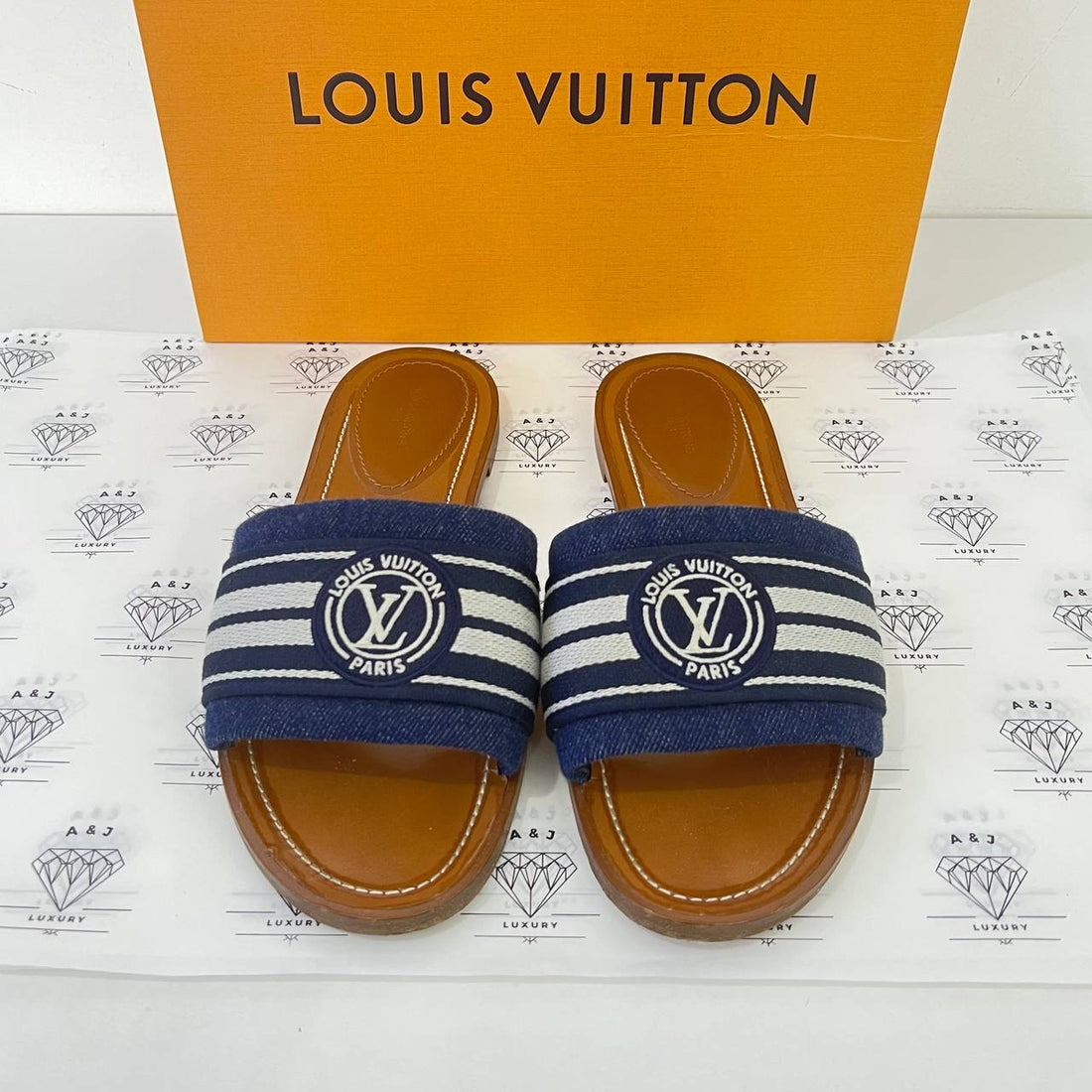 [PRE LOVED] Louis Vuitton Lock it Mules in Size 41EU