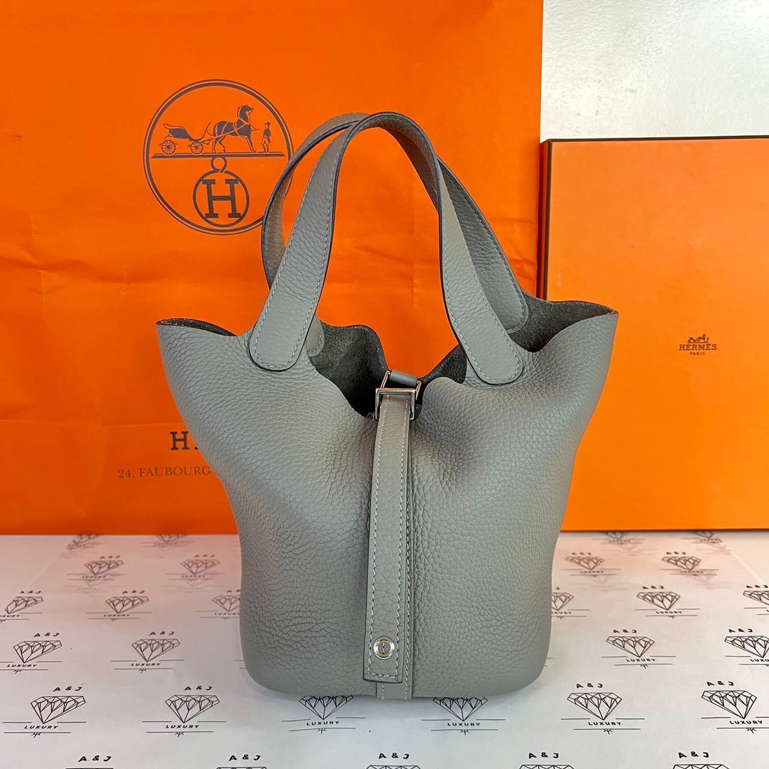 [PRE LOVED] Hermes Picotin Lock 18 in Gris Meyer Clemence Leather PHW (Stamp W - 2024)