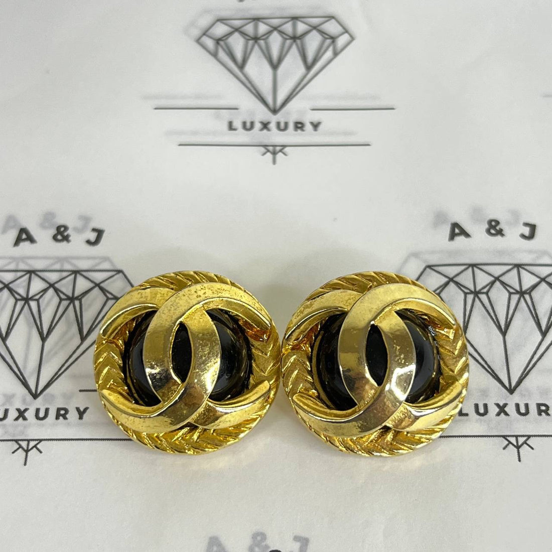 [PRE LOVED] Chanel Coco Mark Clip-on Earrings in Gold