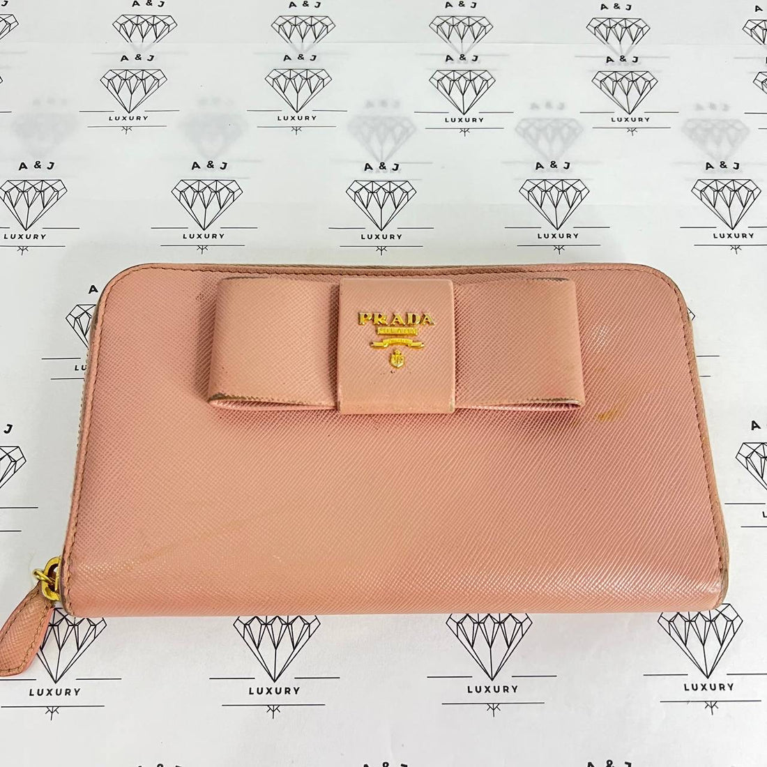 [PRE LOVED] Prada Bow Zip Long Wallet in Pink Saffiano GHW
