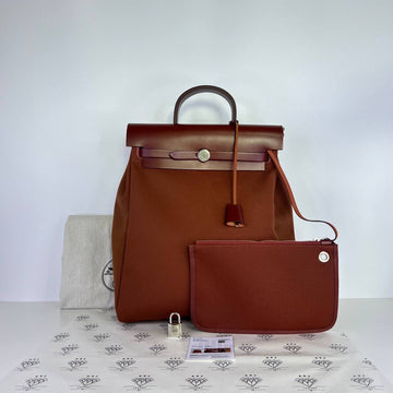 [PRE LOVED] Hermes Herbag Backpack in Rouge H Toile PHW (Stamp Z - 2021)