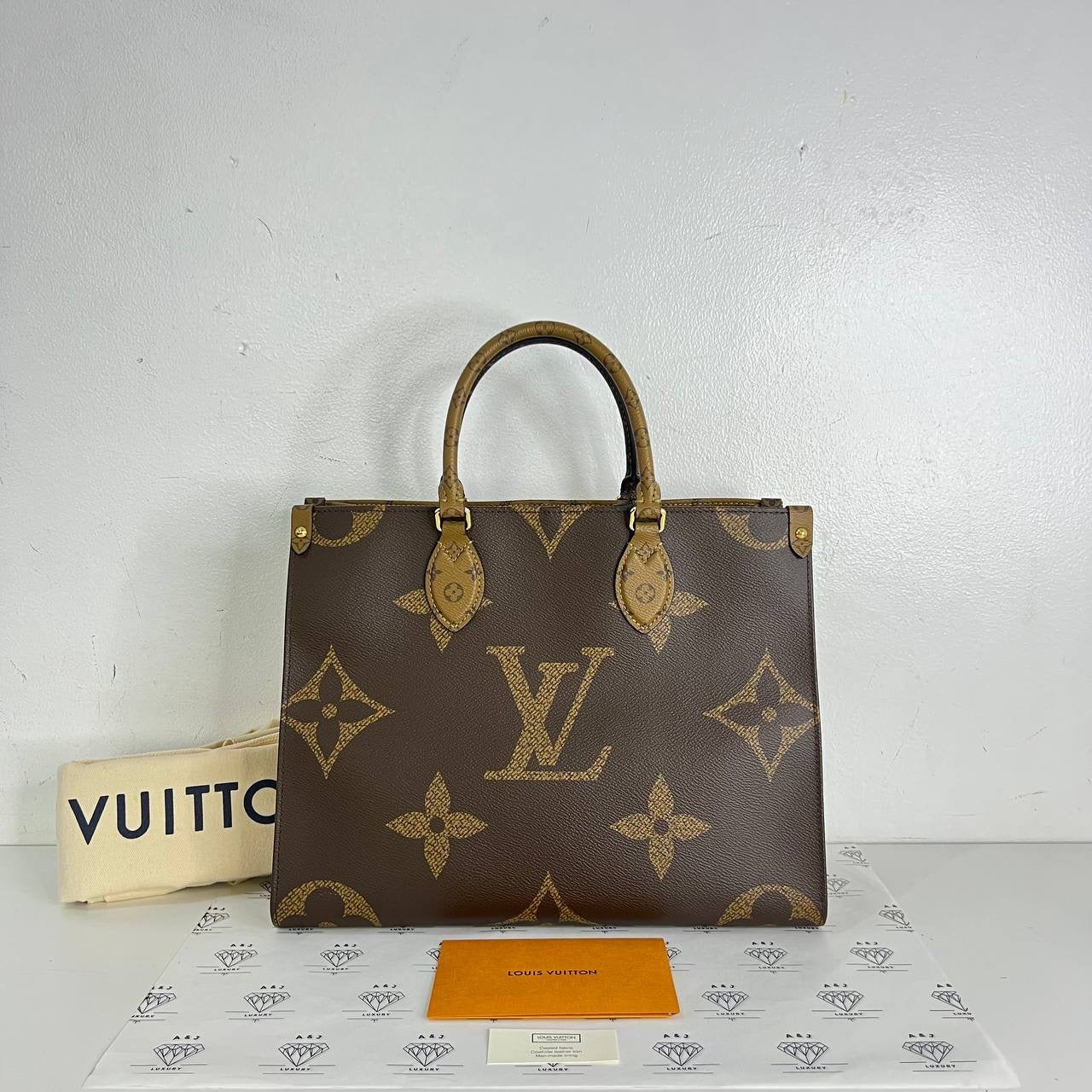 [PRE LOVED] Louis Vuitton OnTheGo MM in Reverse Monogram Canvass (microchipped)