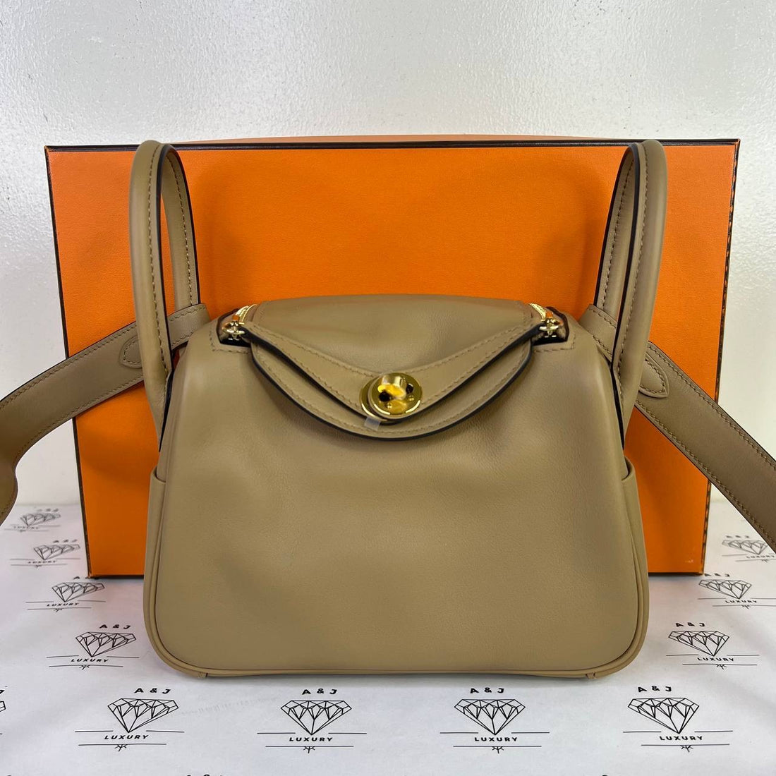 [PRE LOVED] Hermes Mini Lindy Verso in Chai/Mauve Pale Swift Leather GHW (Stamp W - 2024)