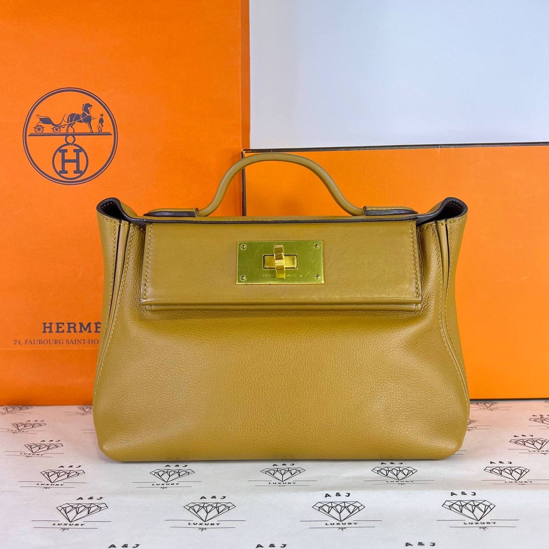 [PRE LOVED] Hermes Mini 24/24 in Caramel/Rouge Sellier/Sesame Evercolor Leather GHW (Stamp U - 2022)