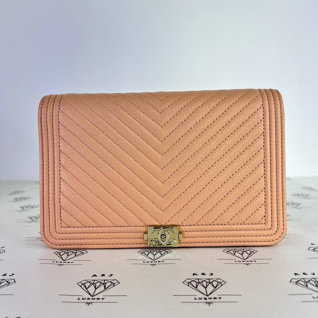 [PRE LOVED] Chanel Leboy Wallet on Chain Chevron in Light Pink Caviar Leather Light Gold HW (microchipped)