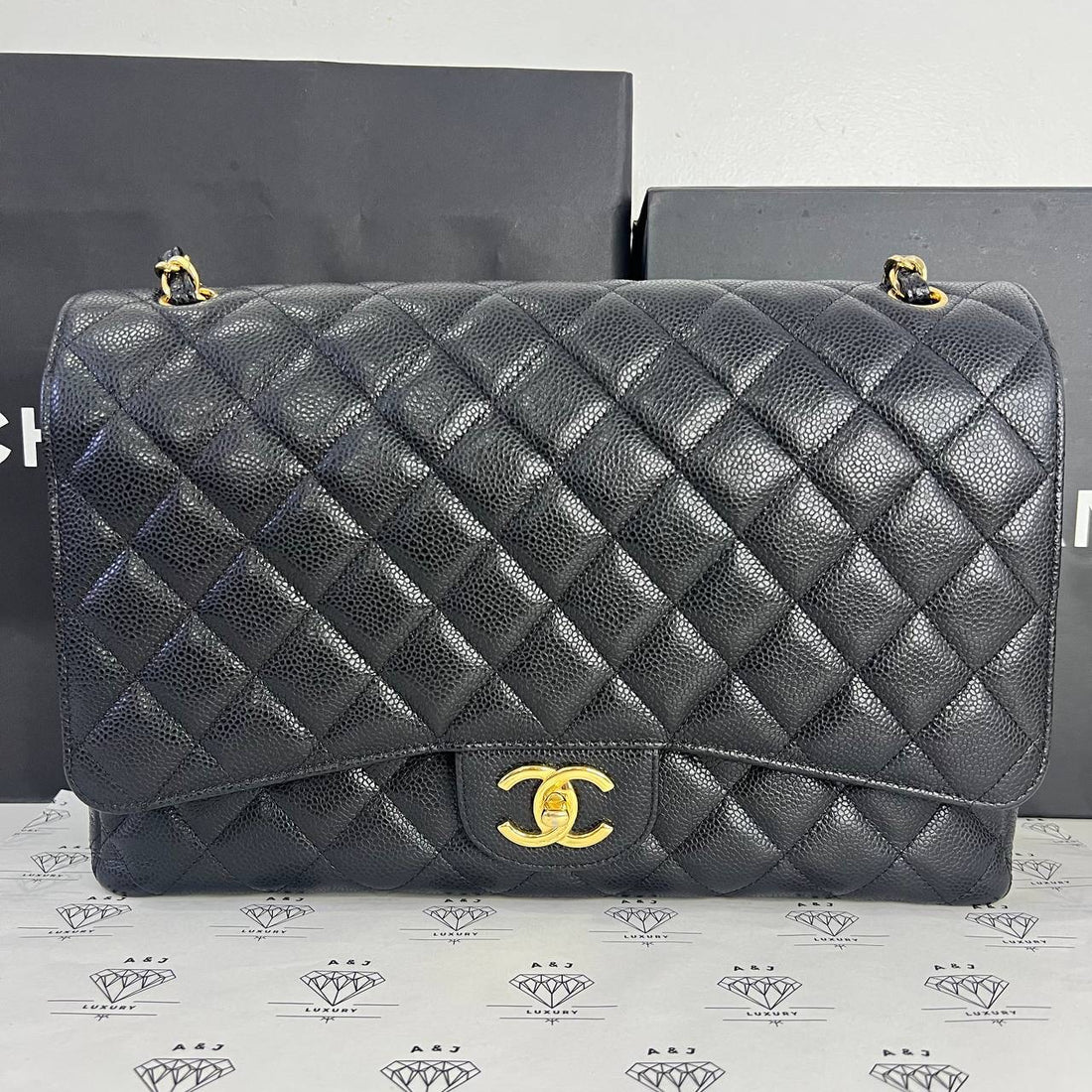 [PRE LOVED] Chanel Maxi Double Flap in Black Caviar GHW (Series 19)