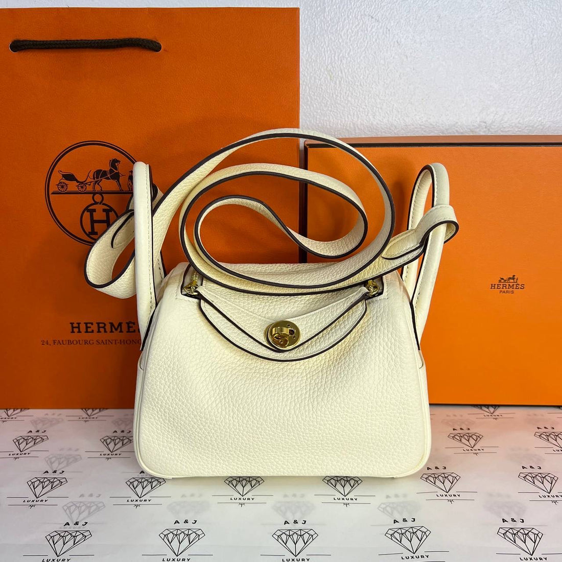 [PRE LOVED] Hermes Mini Lindy in Nata Clemence Leather GHW (Stamp U - 2022)