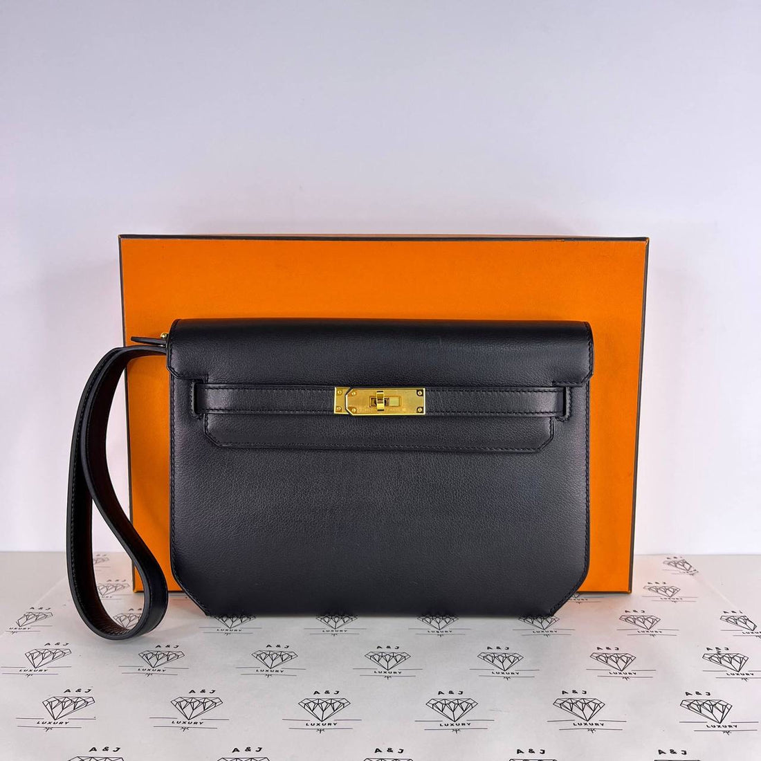 [PRE LOVED] Hermes Kelly 25 Depeches Pouch in Black Evergrain Leather GHW (Stamp U - 2022)
