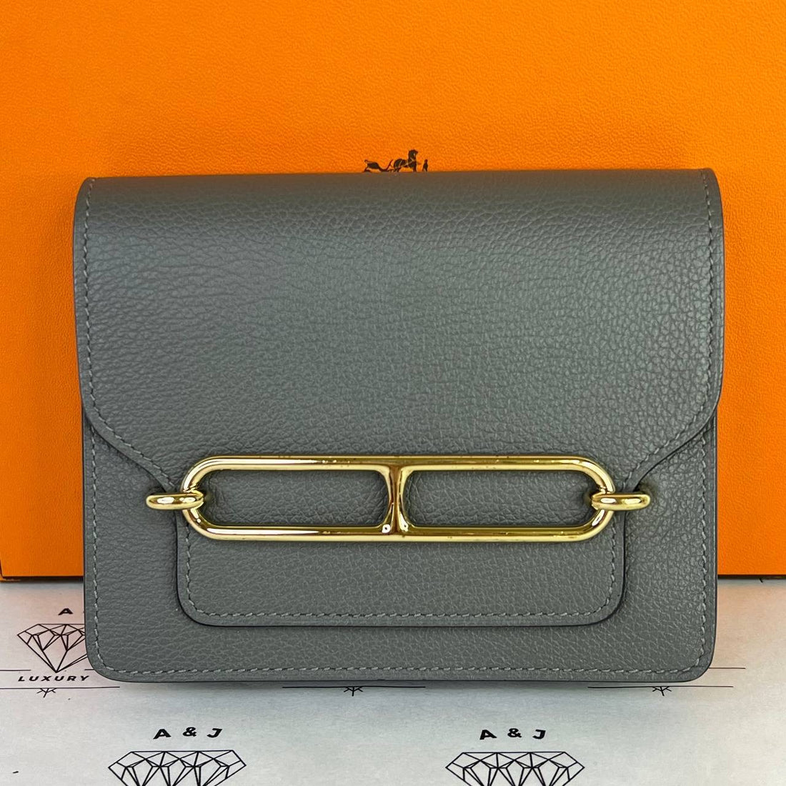 [PRE LOVED] Hermes Roulis Slim in Gris Meyer Evercolor Leather GHW (Stamp U - 2022)