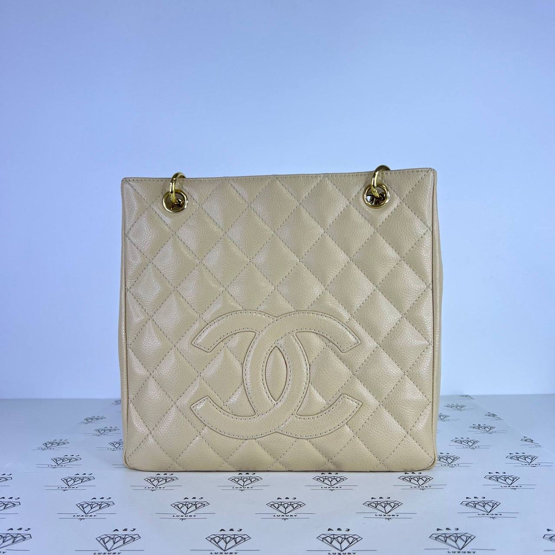 [PRE LOVED] Chanel Petite Shopping Tote (PST) in Beige Caviar Leather GHW (Series 12)