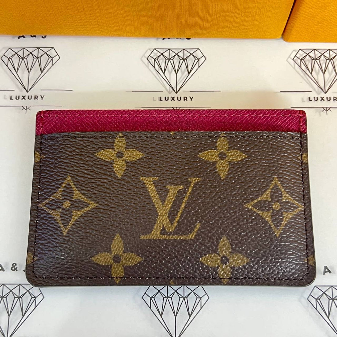 [PRE LOVED] Louis Vuitton Flat Cardholder in Monogram Canvass Fuchsia interior (microchipped)