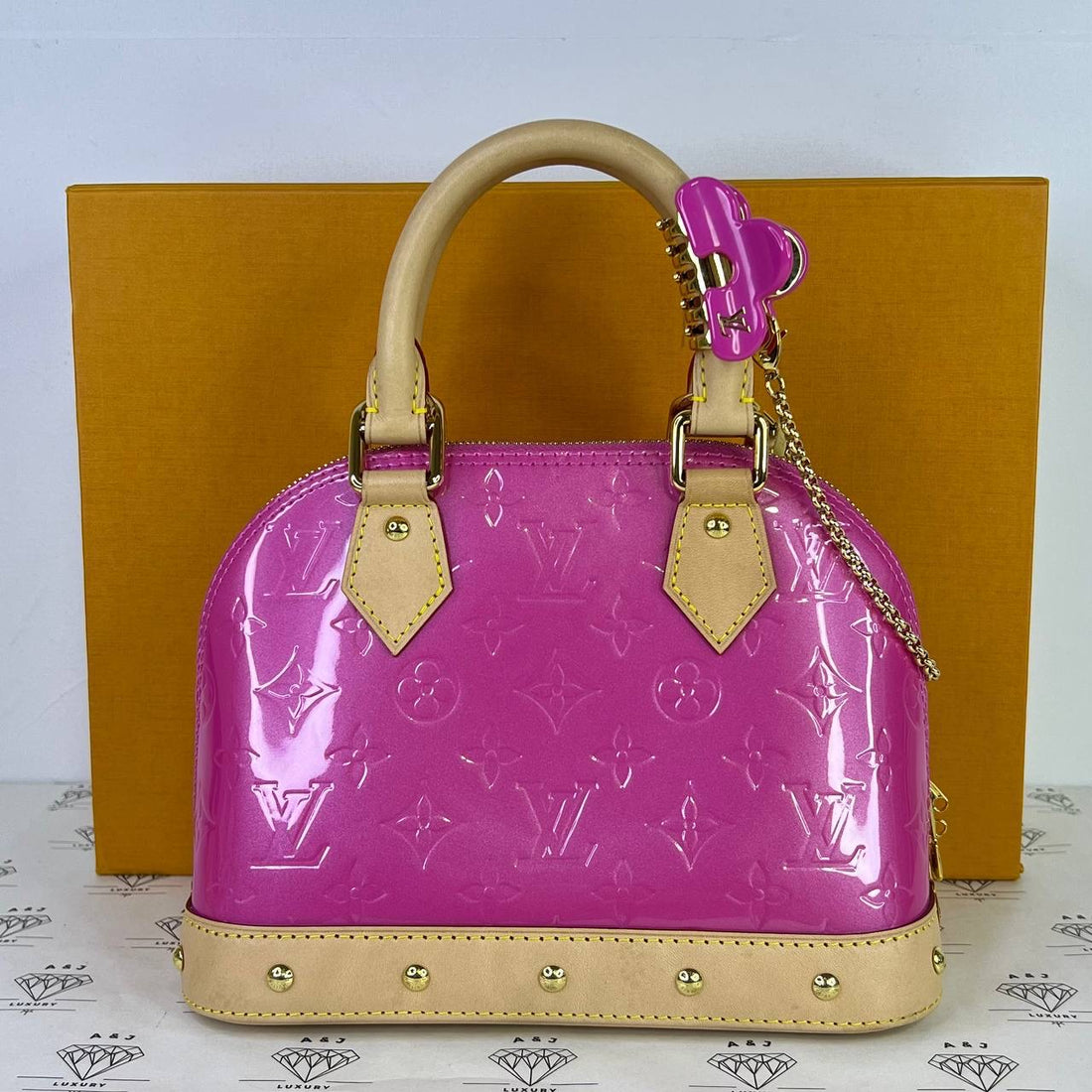 [PRE LOVED] Louis Vuitton Limited Edition Alma BB in Pink Vernis Leather (microchipped)