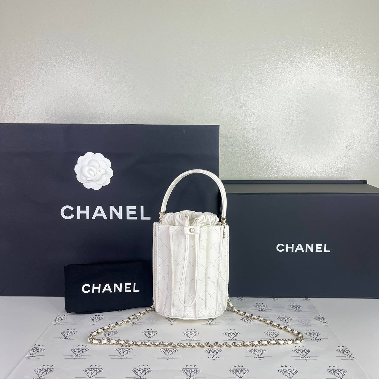 [BRAND NEW] Chanel Mini Bucket Bag in White Lambskin Leather GHW (microchipped)
