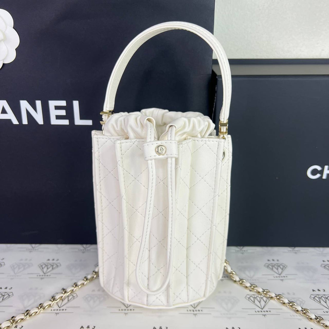[BRAND NEW] Chanel Mini Bucket Bag in White Lambskin Leather GHW (microchipped)