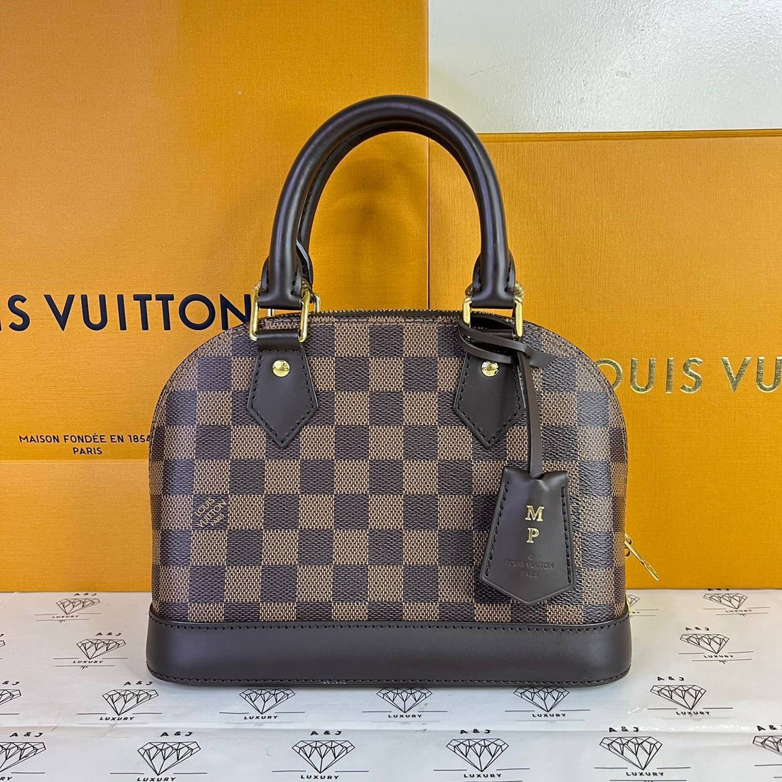 [PRE LOVED] Louis Vuitton Alma BB in Damier Ebene Canvass with MP initials (microchipped)