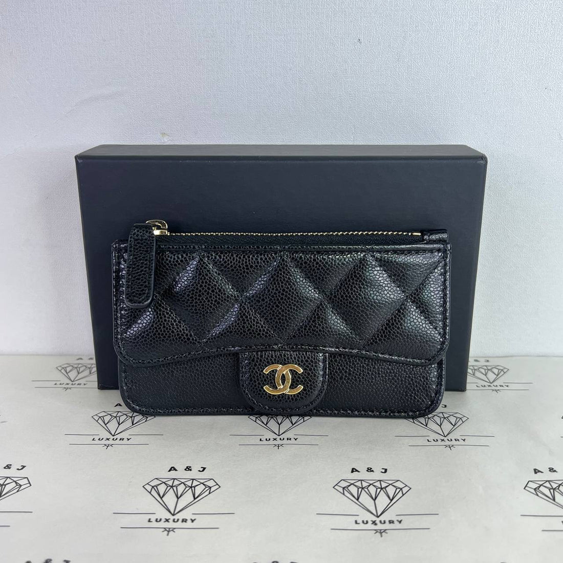 [PRE LOVED] Chanel Zip and Flap Cardholder in Black Caviar Leather GHW (microchipped)