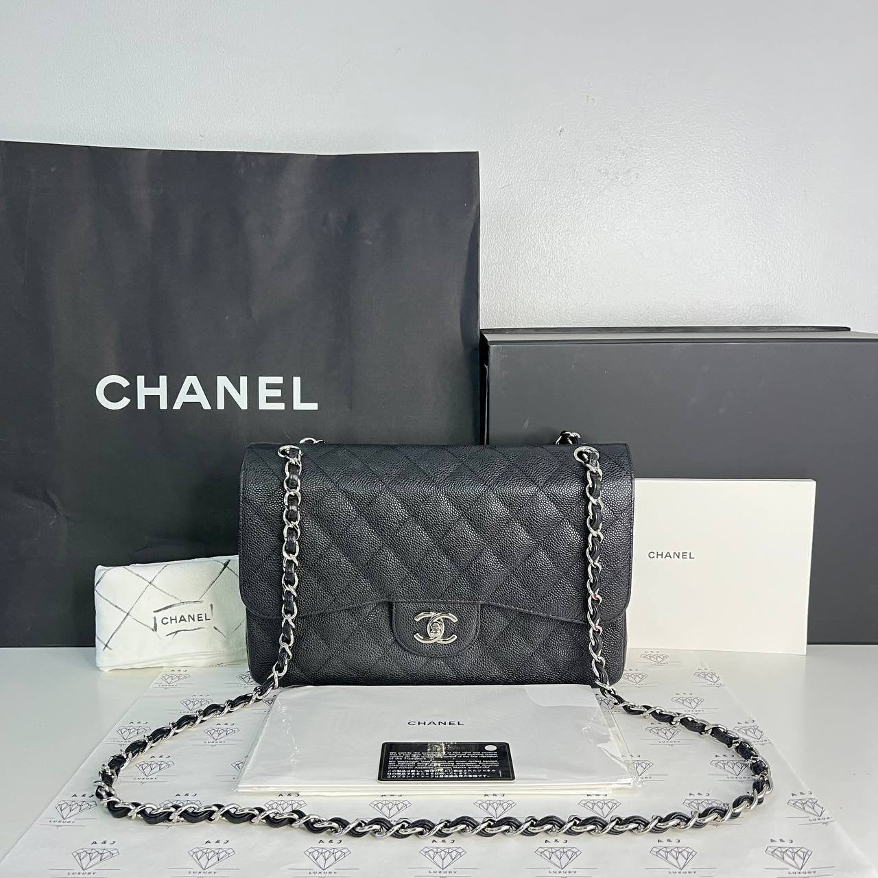 [PRE LOVED] Chanel Classic Jumbo Double Flap in Black Caviar SHW (Series 18)