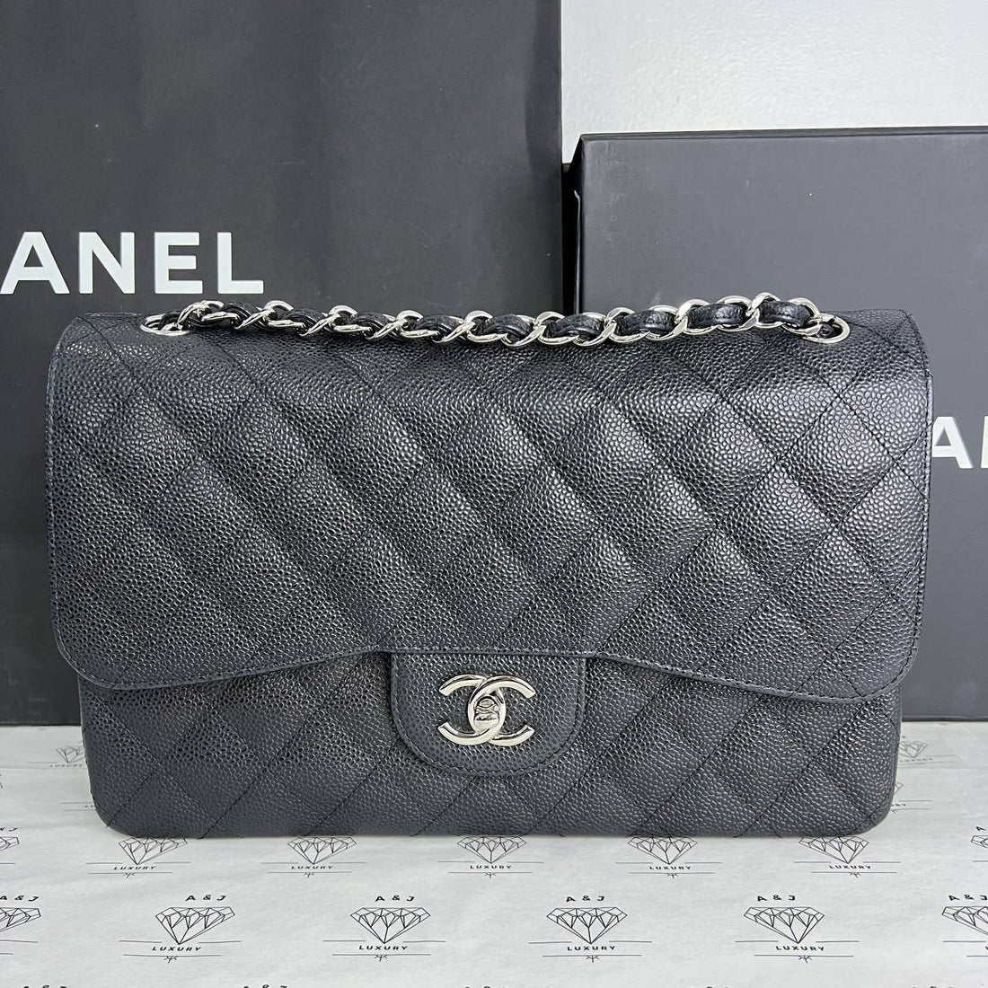 [PRE LOVED] Chanel Classic Jumbo Double Flap in Black Caviar SHW (Series 18)