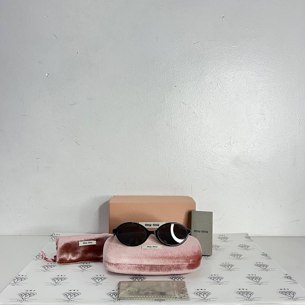 [PRE LOVED] Miu Miu Round Sunglasses SMU04Z-F in Black