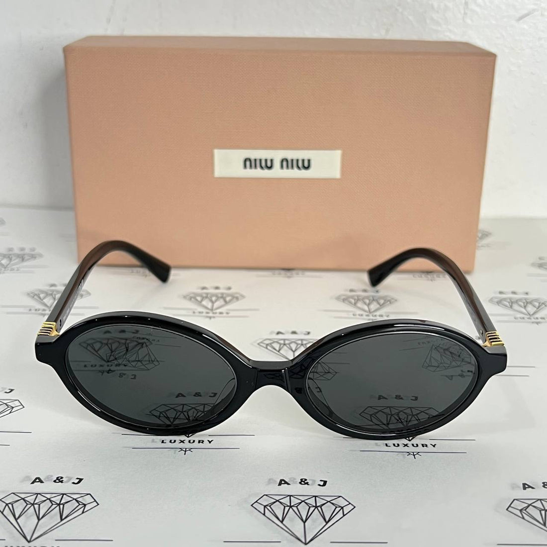 [PRE LOVED] Miu Miu Round Sunglasses SMU04Z-F in Black