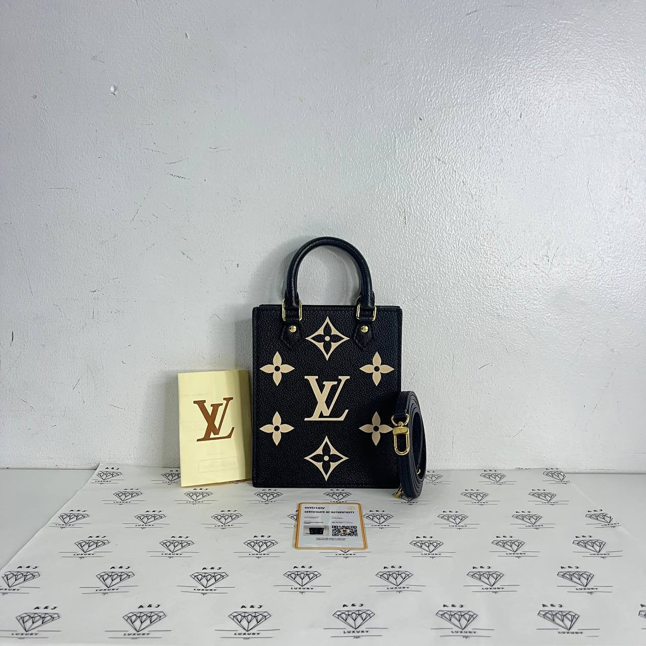 [PRE LOVED] Louis Vuitton Petite Sac Plat in Black/Creme Bicolor Empreinte Leather (microchipped)