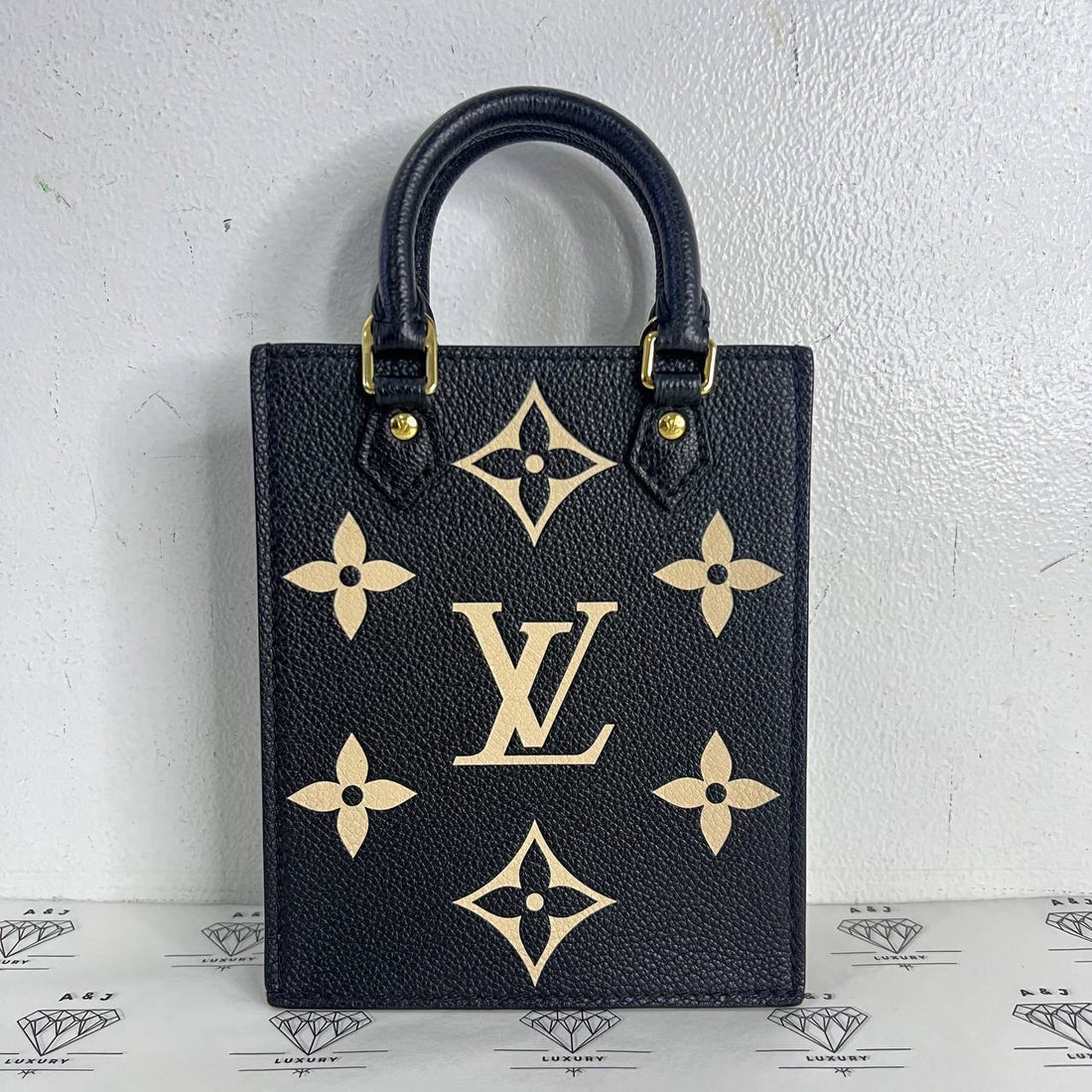 [PRE LOVED] Louis Vuitton Petite Sac Plat in Black/Creme Bicolor Empreinte Leather (microchipped)
