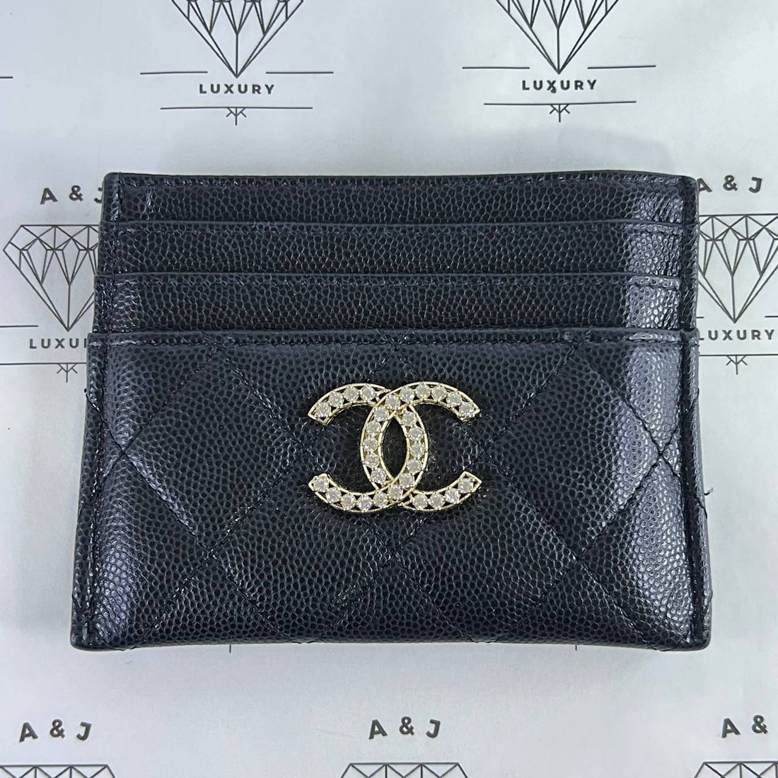 [PRE LOVED] Chanel Seasonal Flat Cardholder in Black Caviar Leather Light Gold HW (microchipped)