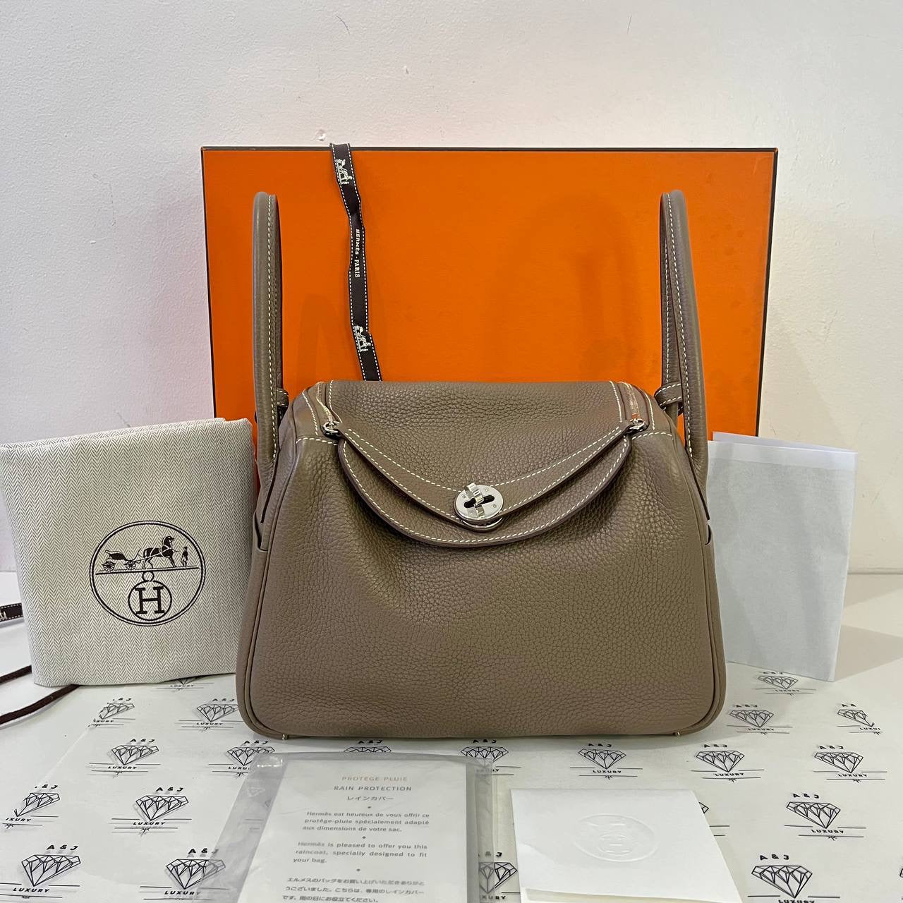 [PRE LOVED] Hermes Lindy 26 in Etoupe Clemence Leather PHW (Stamp X - 2016)