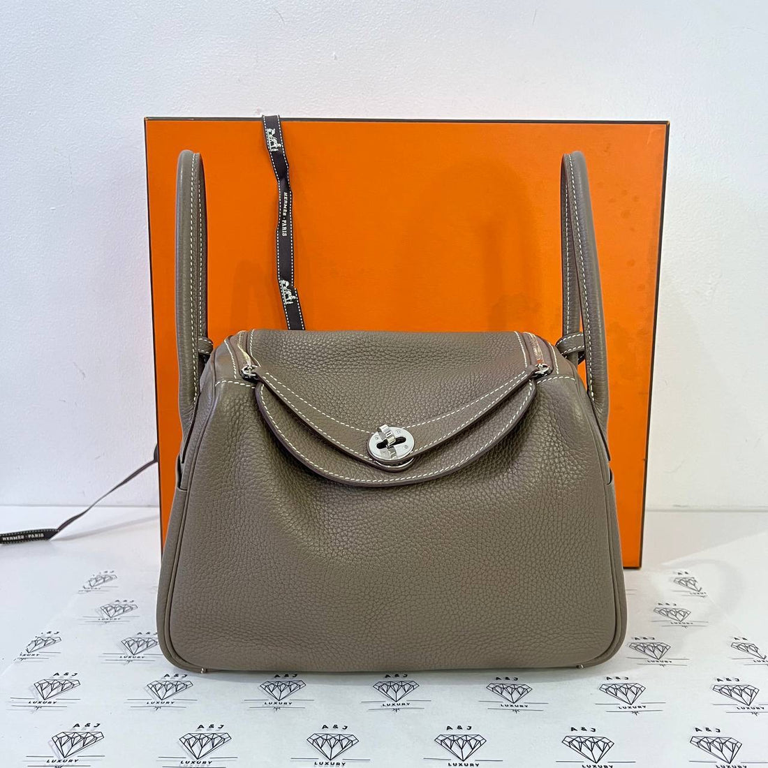 [PRE LOVED] Hermes Lindy 26 in Etoupe Clemence Leather PHW (Stamp X - 2016)