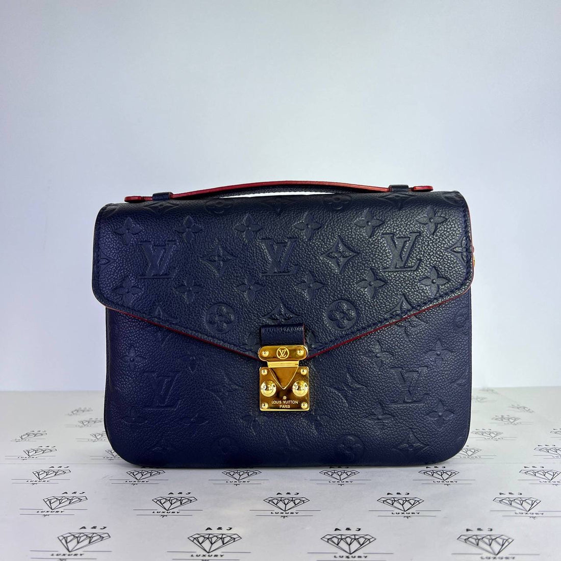 [PRE LOVED] Louis Vuitton Pochette Metis in Marine Rouge Empreinte Leather GHW (DU0139)