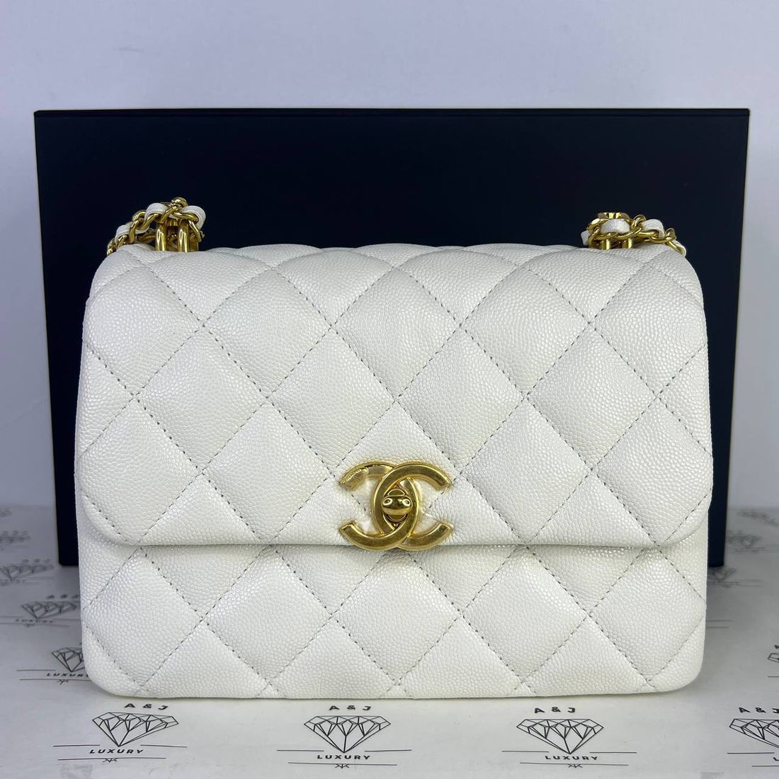 [PRE LOVED] Chanel Mini Coco First in White Caviar Leather GHW (microchipped)