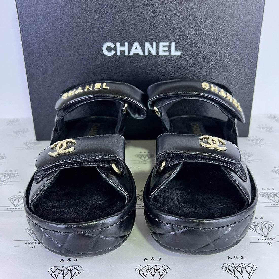 [PRE LOVED] Chanel Shiny Calfskin Logo Platform Sandals in Black Size 39EU