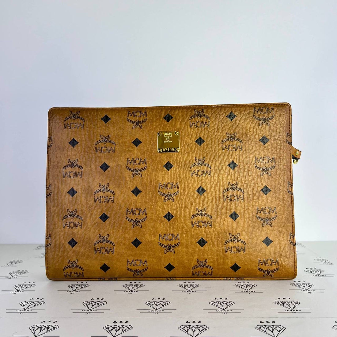 [PRE LOVED] MCM Logo Visetos Wristlet in Cognac GHW