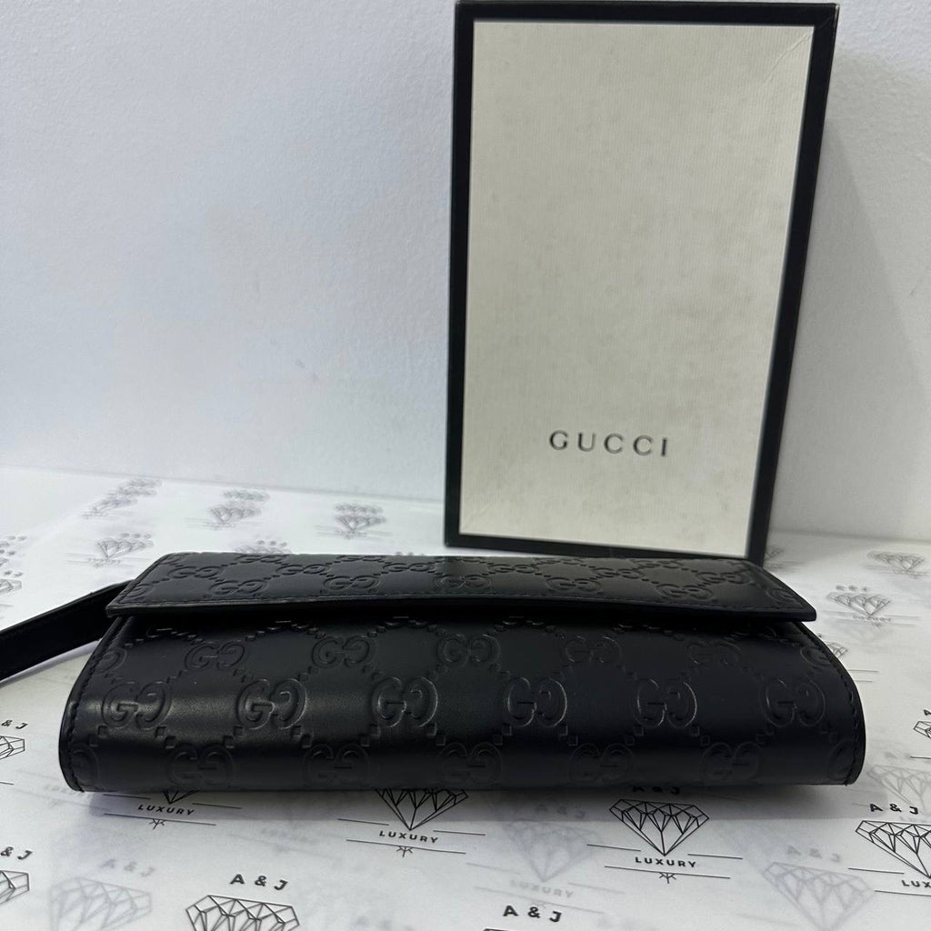 [PRE LOVED] Gucci Guccissima Wristlet in Black