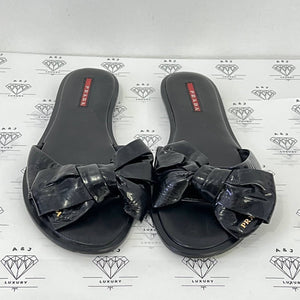 [PRE LOVED] Prada Bow Flat Mules in Black Patent Leather Size 39EU