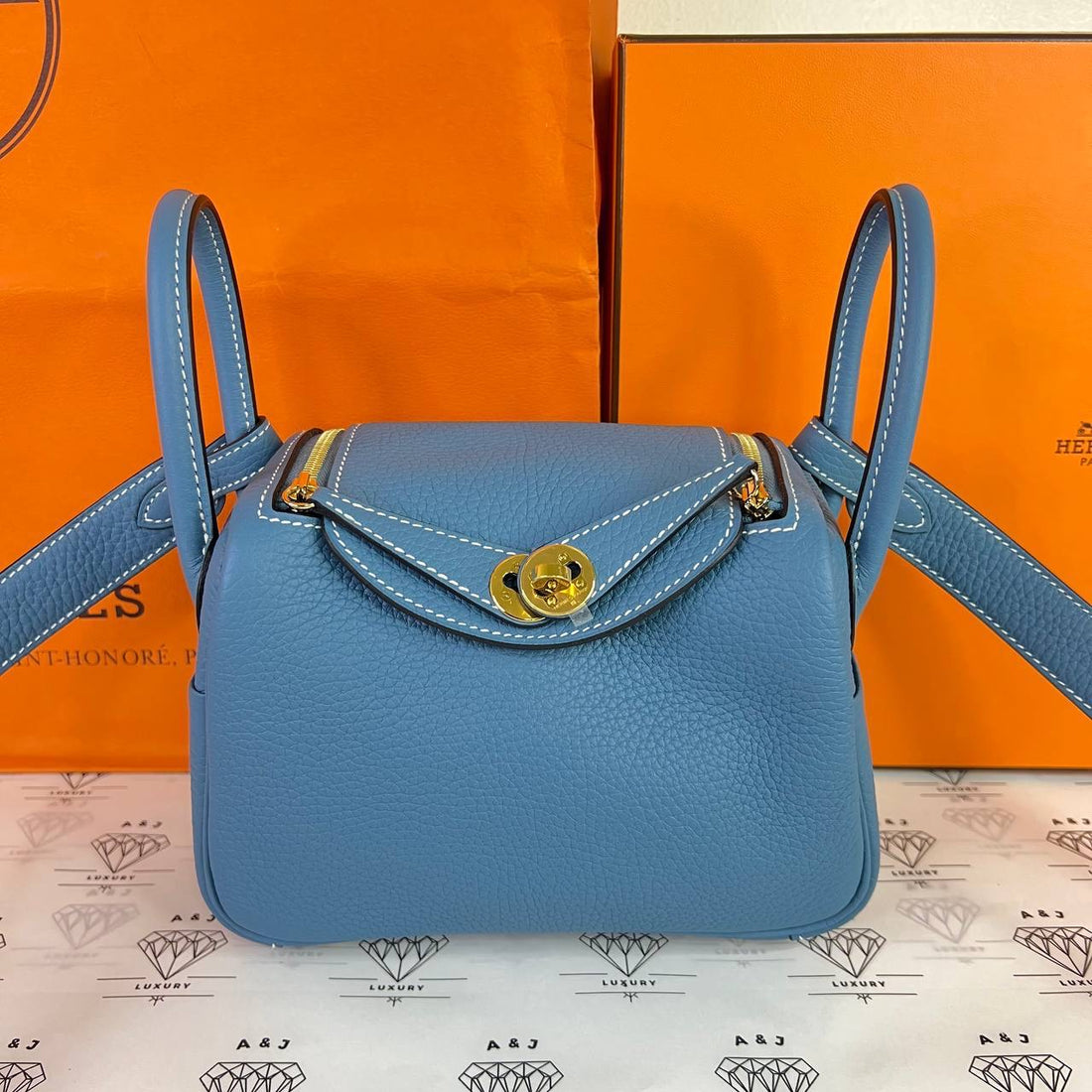 [PRE LOVED] Hermes Mini Lindy in Blue Jean Clemence Leather GHW (Stamp B - 2023)
