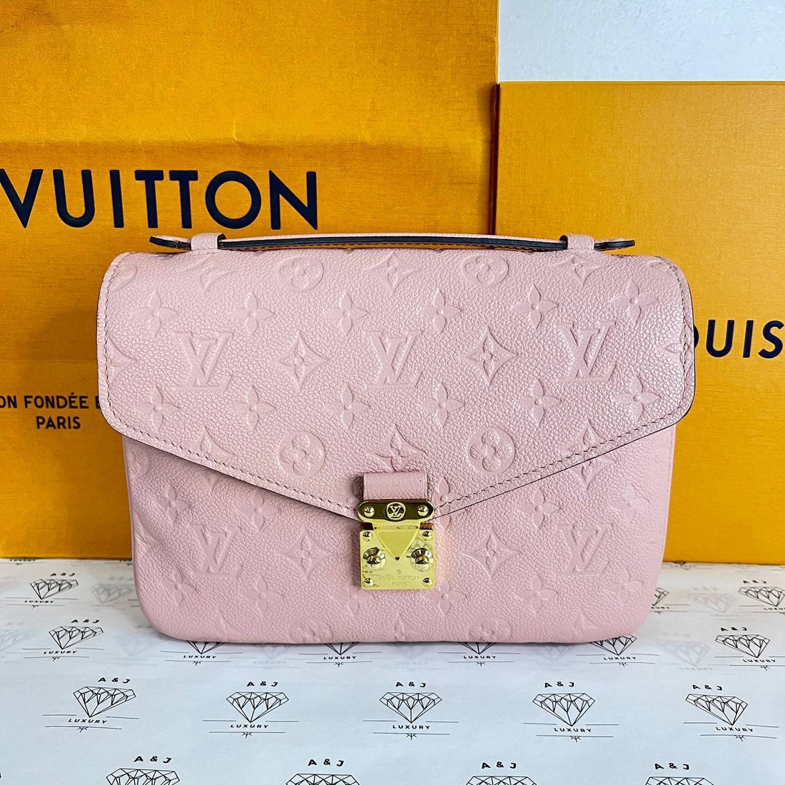 [PRE LOVED] Louis Vuitton Pochette Metis in Light Pink Empreinte Leather GHW (DU0169)